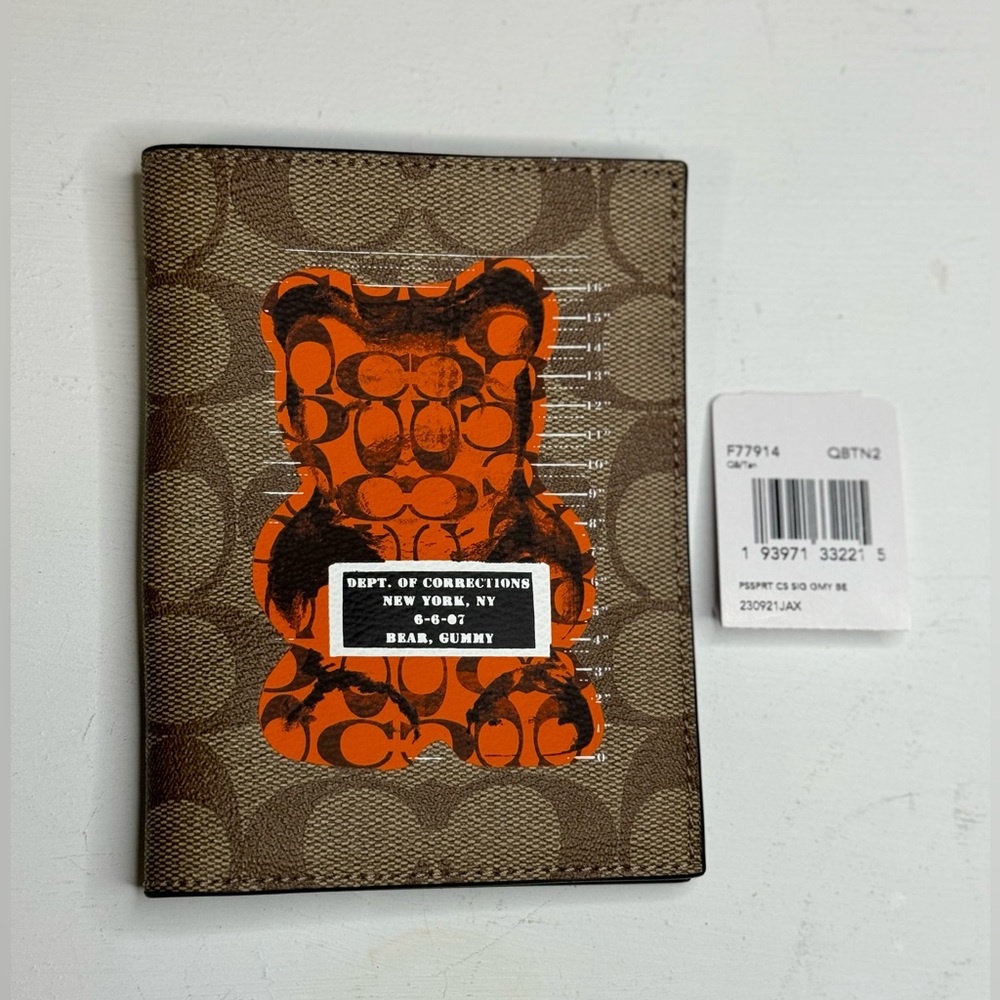 NWT COACH passport case with the bear